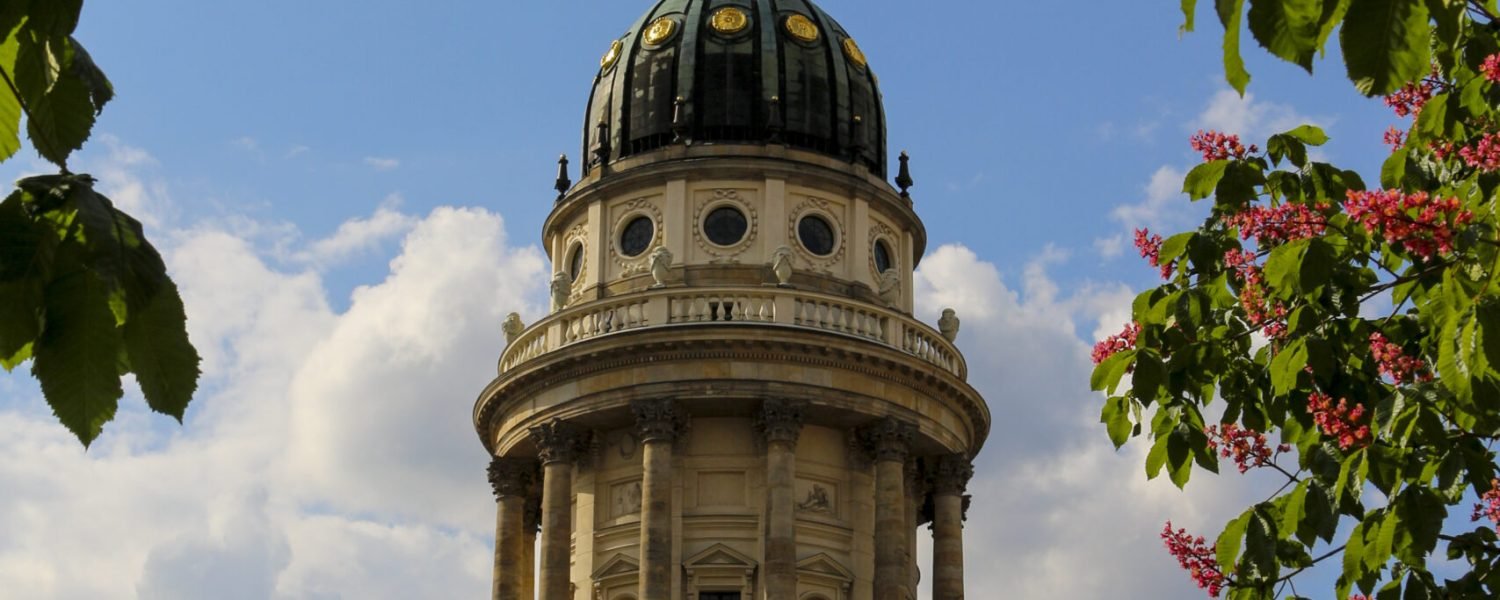 A vertical shot of the gorgeous Deutscher Dom in Berlin, Germany during daylight