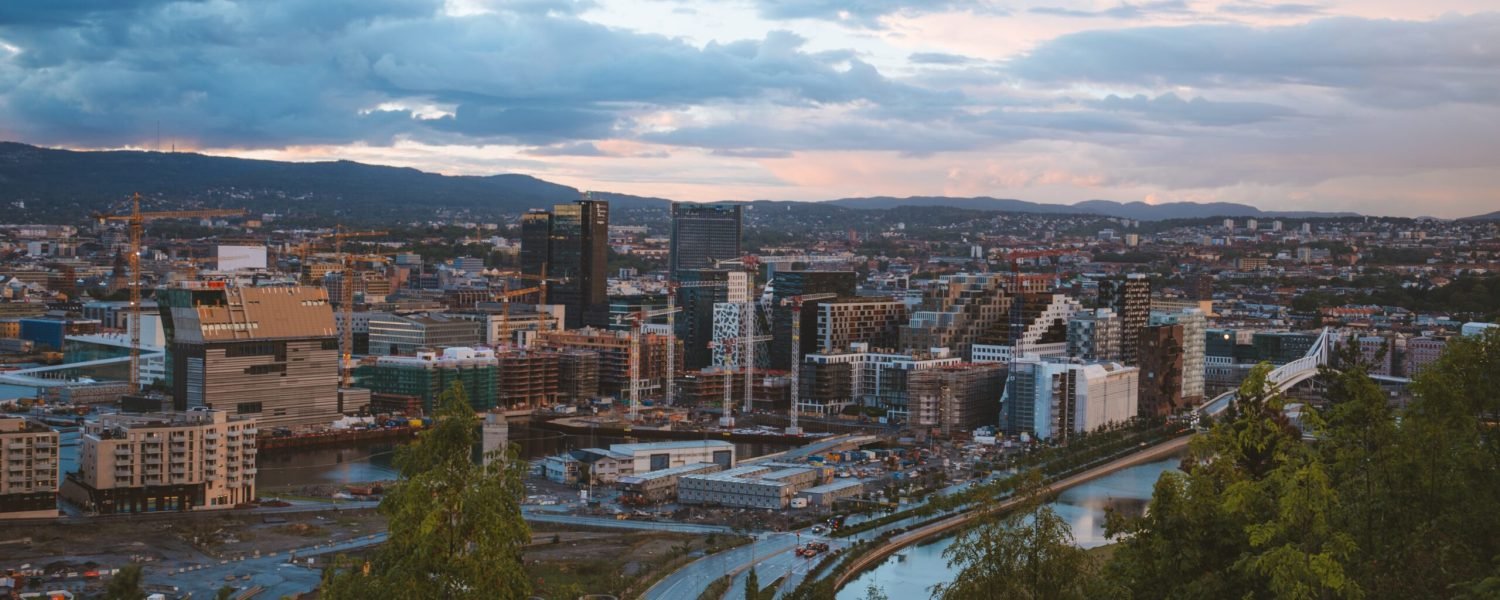 An aerial shot of the houses and buildings in the city of Oslo in Noway